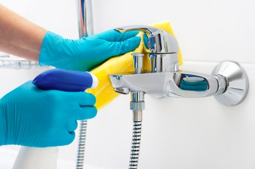Cleaning curtains in a Chelsea flat with careful access handling