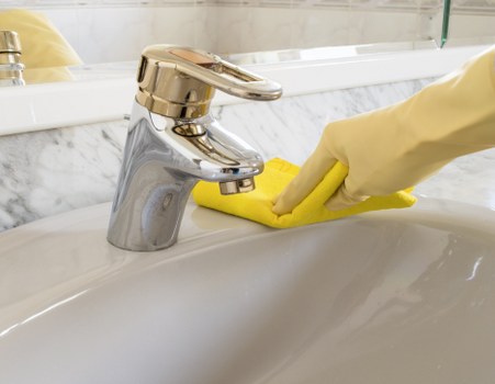 Technician treating mattress stains in a Chelsea flat